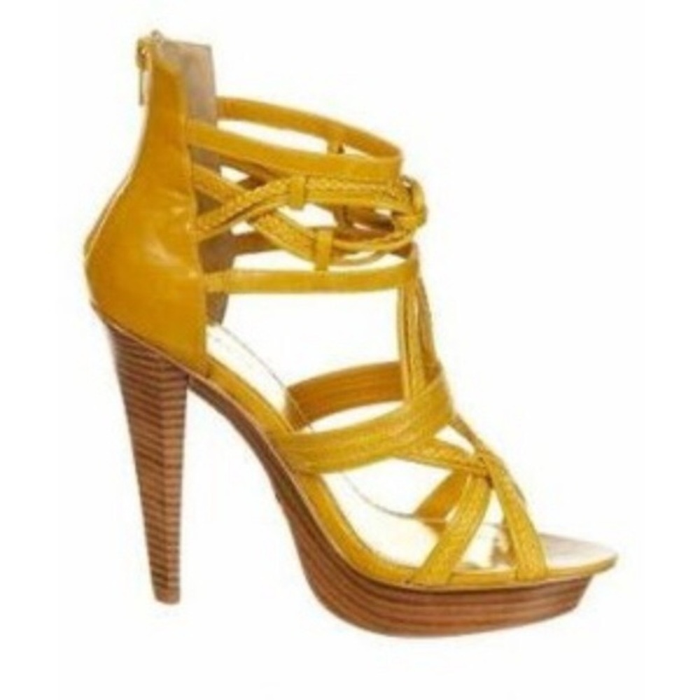 BEBE “Rosario” stacked heels in yellow